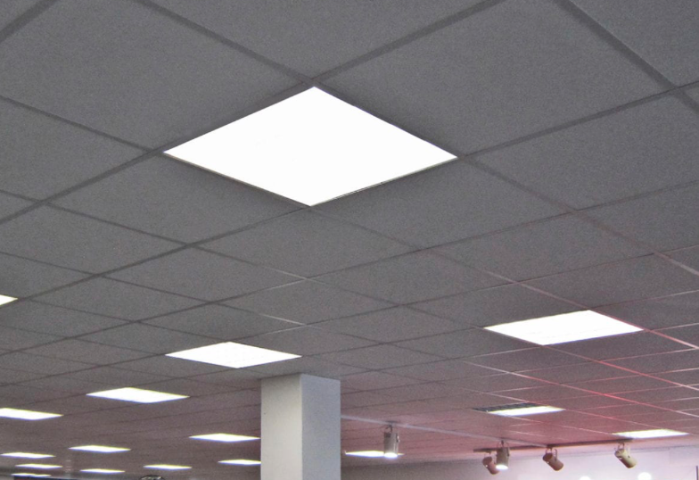 Newly installed commercial lighting fixtures in an office space, providing bright and efficient illumination.