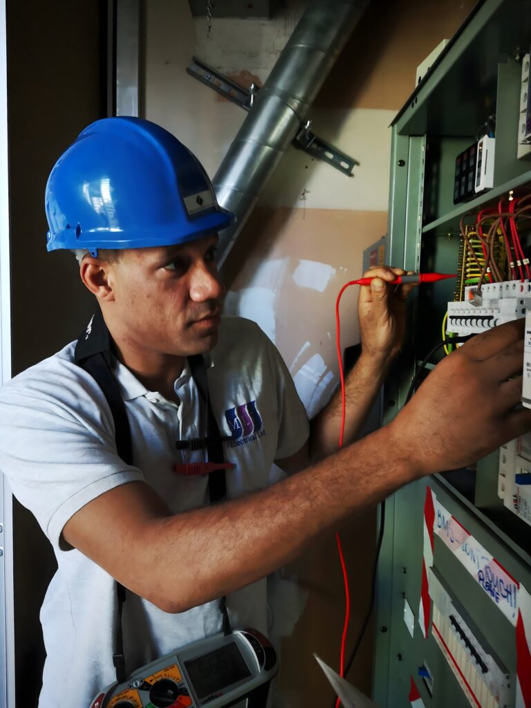 MIT Commercial Engineer Testing Electrical Panel