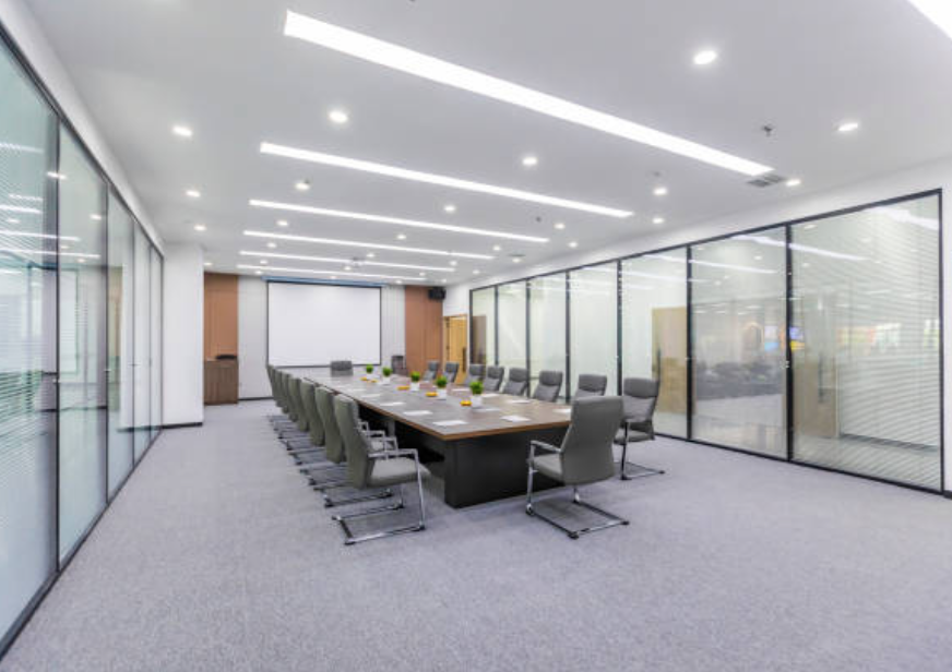 A modern office space with newly installed LED lighting fixtures, providing bright and energy-efficient illumination.