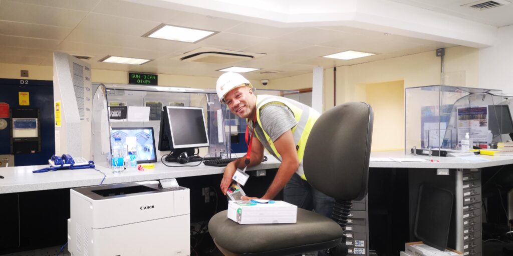 Testing and inspection being conducted at a police station as part of an Electrical Installation Condition Report.